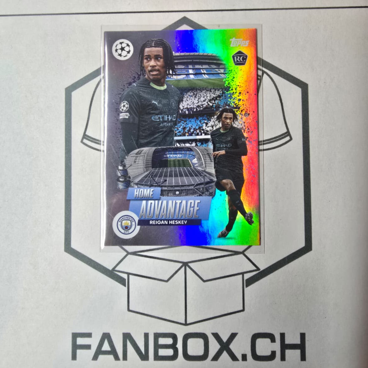Topps 2025-26 UCC Reigan Heskey RC Home Advantage Case Hit